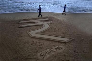 Rupee fall: NRIs take loans to remit money Rupee fall: NRIs take loans to remit money
