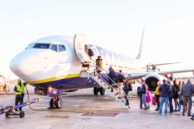 Why do passengers only board airplanes from the left side?
