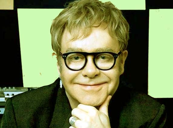 Elton John has a room full of  plastic dogs!