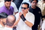 Saif Ali Khan latest video, Saif Ali Khan health bulletin, saif ali khan walks out of hospital after getting discharged, Kareena kapoor